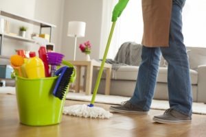 man doing house cleaning in living room auckland